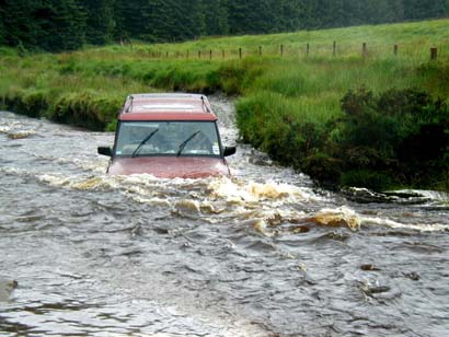 Landrover Discovery 3.5V8 crossing river at Strata Florida