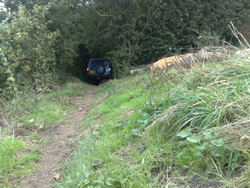Descending down a narrow wooded lane to Pilgrims Way in Kent