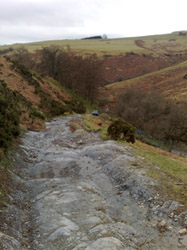 Discovery climbing steep mountain track from Fron