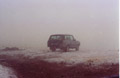 Snow falling steadily as we set out across the mountains from Tour De Mir