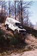 On the "Play Ramp" practising climbs and descents in Uriah the Land Rover 110