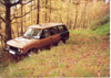 Range Rover in the woods