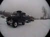 Convoy of Landrovers on the snow trail in mid winter in south east Poland 