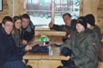 The motley crew take a break in the warm at the ski lifts