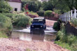 Landrover 110 3.5V8 CSW driving through the Ford near Standon