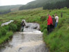 Strata Florida, Julian checks the water depth watched by the others