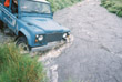 Dick's Landrover 110 CSW entering the fast flowing water at Strata Florida 
