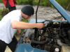 David applying first aid to the stricken Landrover 110 CSW at Strata Florida 