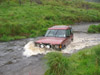 Phil charging throught the fast flowing river at Strata Florida in his Landrover Discovery