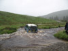 Dick's Landrover 110 CSW emerging from a ford at Strata Florida