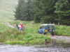 the lads towing the Landrover 110 CSW to safety whilst being filmed by Jasmin